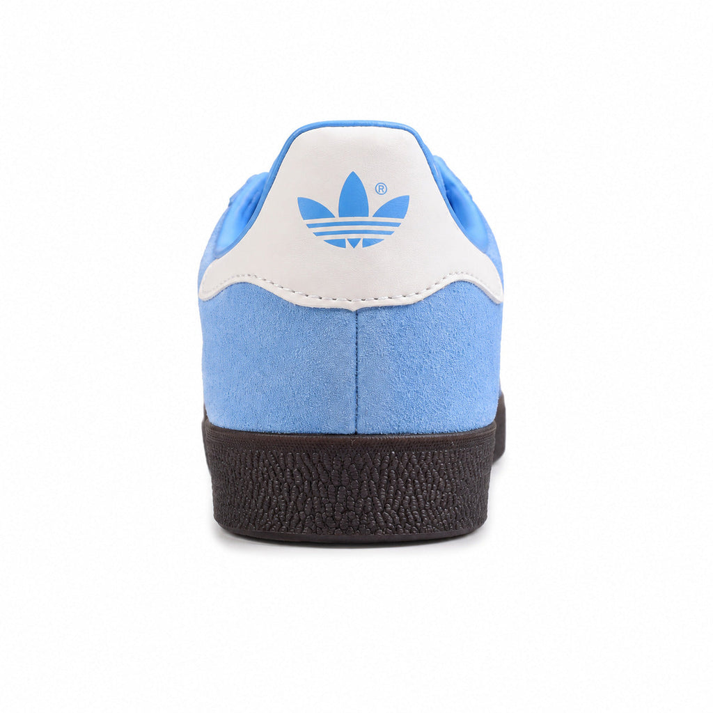Adidas Gazelle azul cielo branco detalle talón logo trefoil