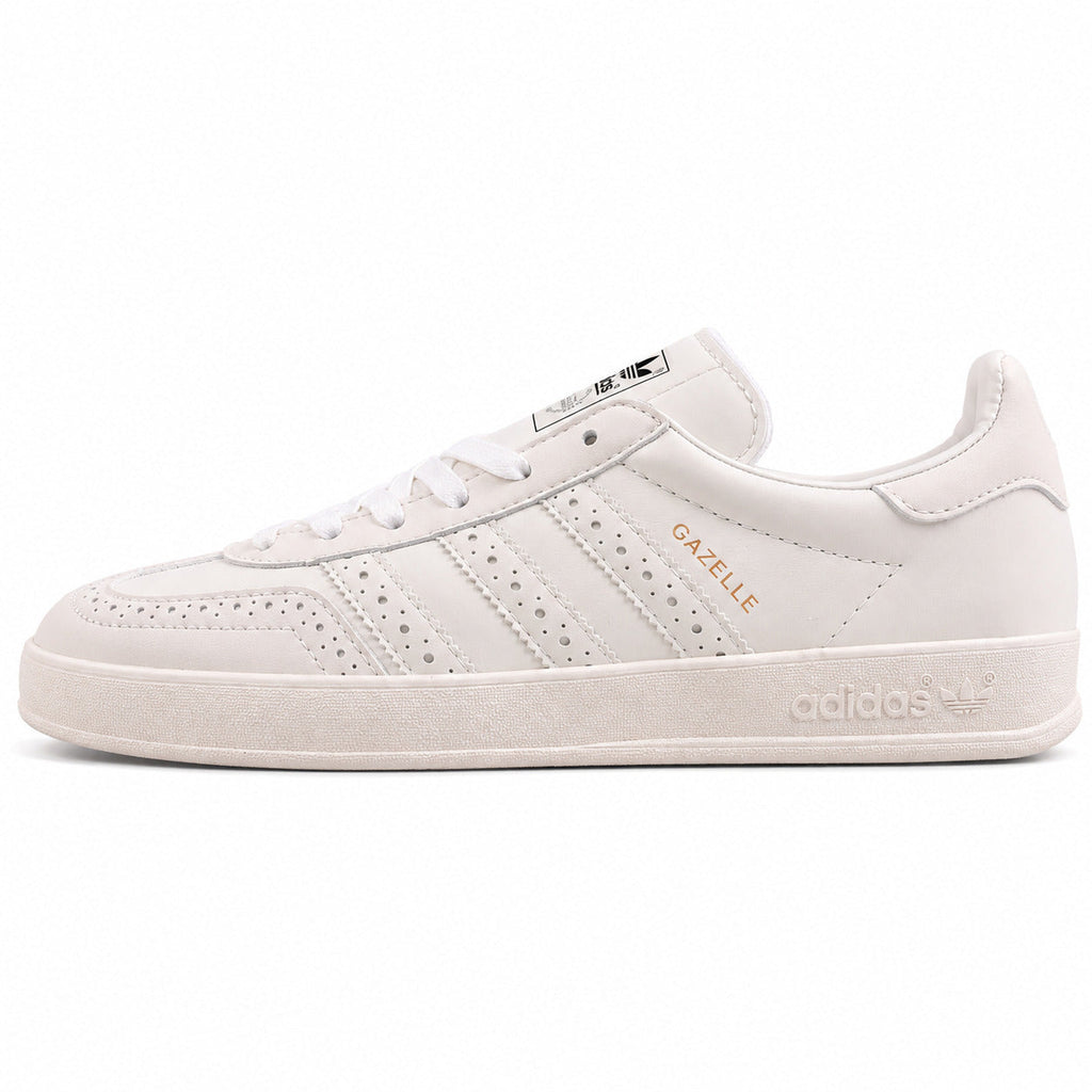 Adidas Gazelle Indoor triple branco pele perforado lateral izquierda