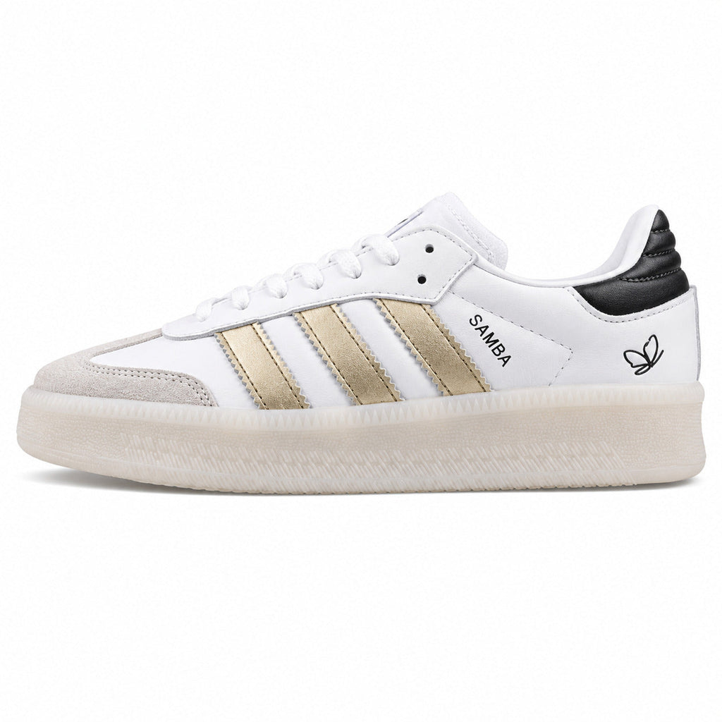 Adidas Samba XLG branco bandas doradas talón preto plataforma crema perfil izquierdo