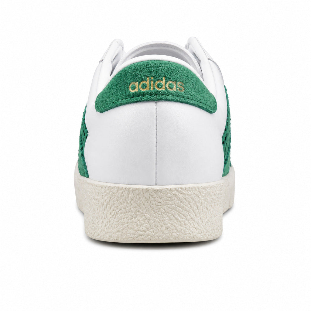 Adidas Taekwondo x Sporty Rich branco detalle talón ante verde adidas dourado suela crema