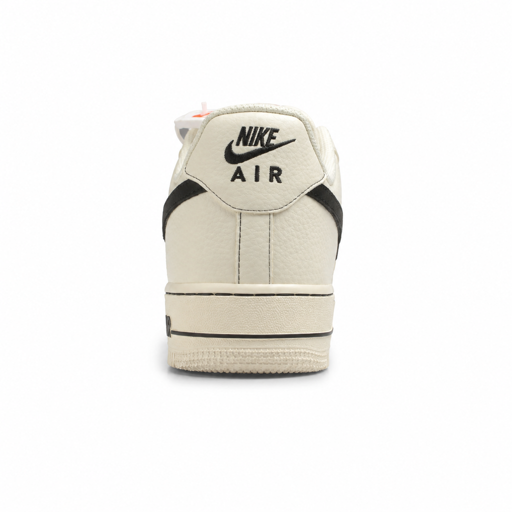 Nike Air Force 1 Low Light Bone preto talón detalle Nike Air