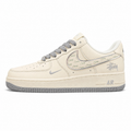 Nike Air Force 1 Low x Stussy beige cinzento lateral izquierda
