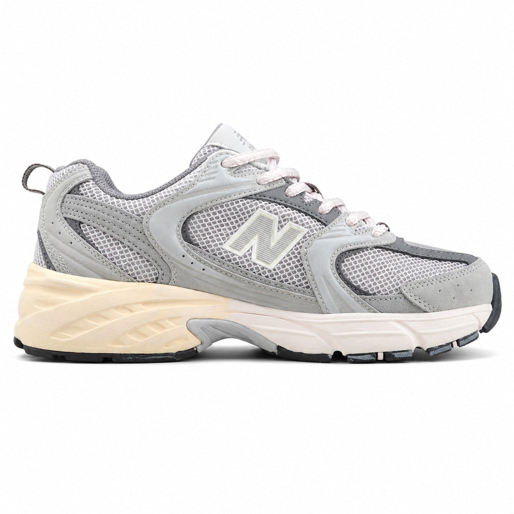 New Balance 530 cinzento crema ante vista lateral derecha