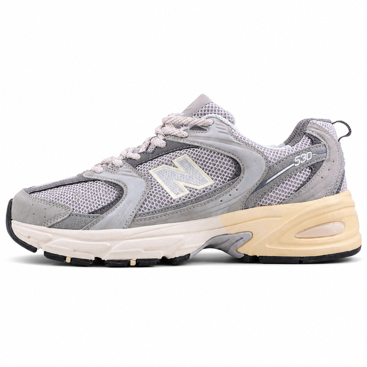 New Balance 530 cinzento crema ante vista lateral izquierda