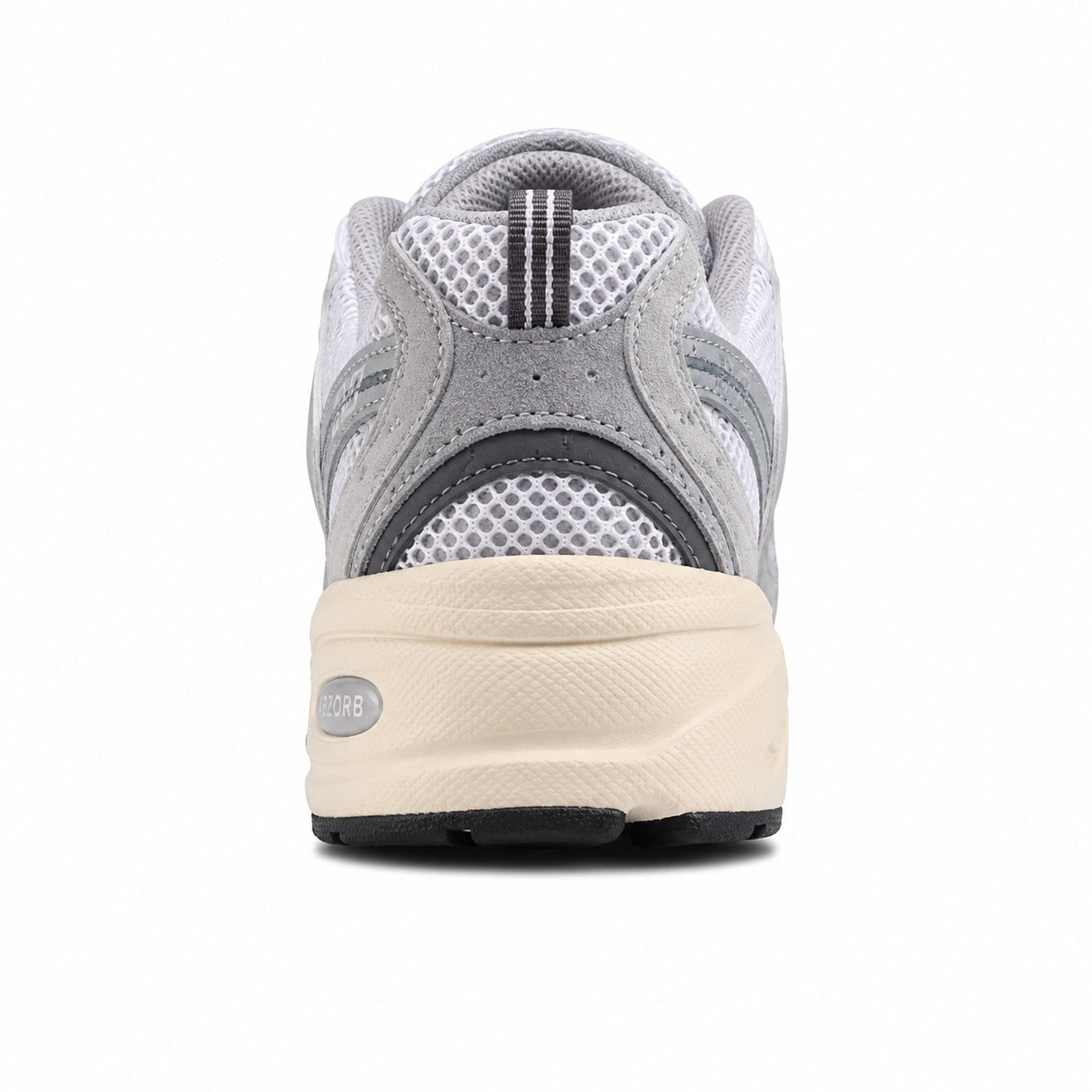 New Balance 530 cinzento crema detalle talón suela crema