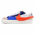 Nike Blazer Low 77 branco azul laranja lateral izquierda