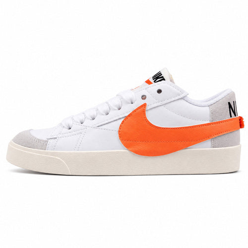 Nike Blazer Low 77 branco laranja lateral izquierda