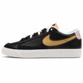 Nike Blazer Low 77 PRM Swoosh 50th preto beige dourado lateral izquierda